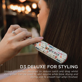 Denman D3 Curly Hair Brush in lifestyle setting on vanity