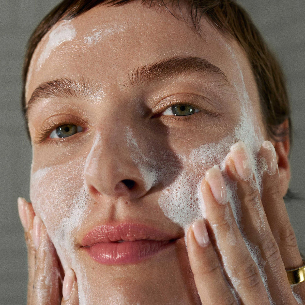 Dermalogica Daily Microfoliant powder being mixed with water
