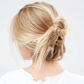Different angles of DEEKA hair clips in use