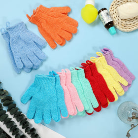 Different colours of CVNDKN Exfoliating Bath Gloves arranged neatly