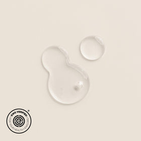 DIME Hyaluronic Acid Serum 1 oz in a bathroom setting