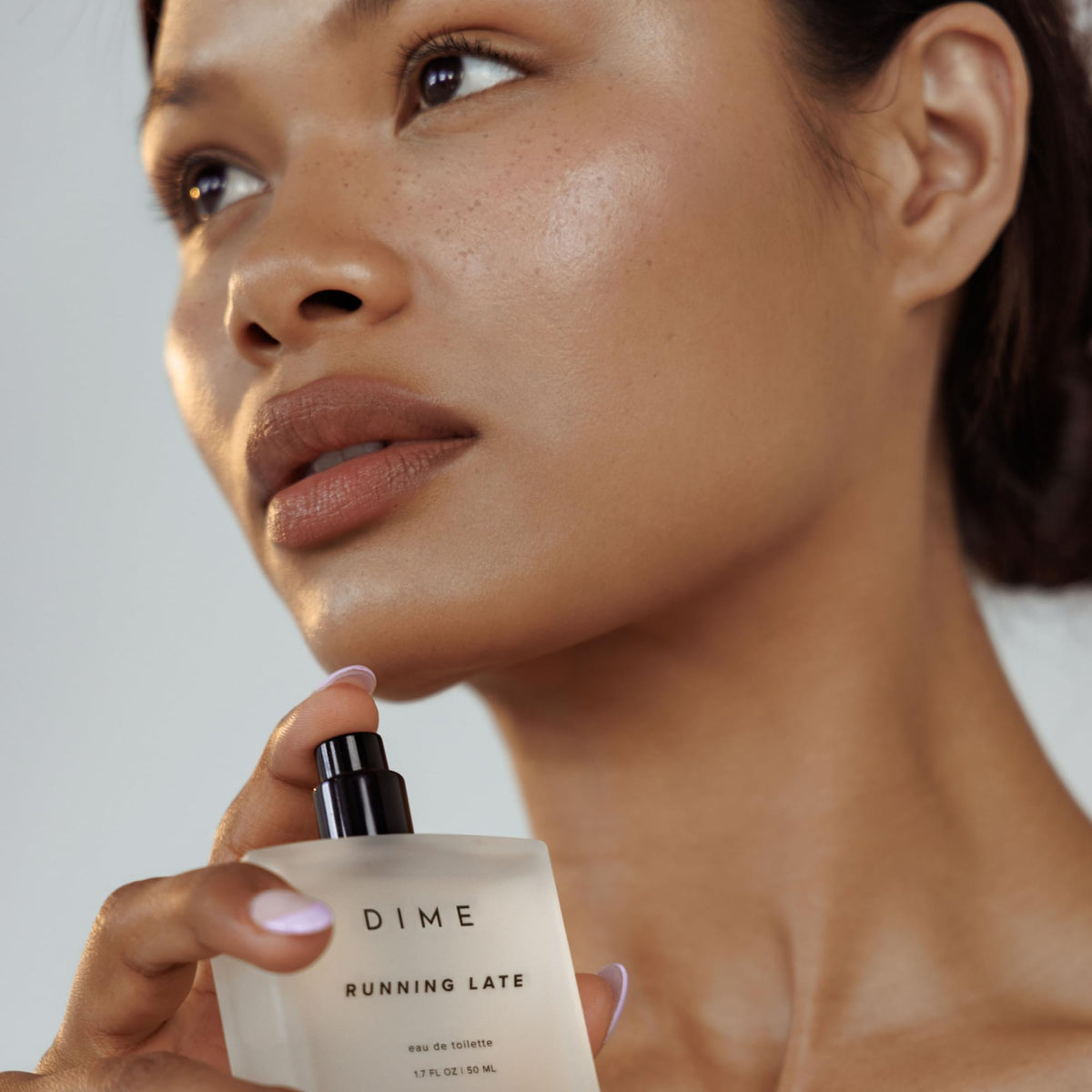 DIME Running Late Perfume details on the label