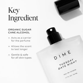 DIME Tuesday Date Night Perfume 1.7 oz on a vanity
