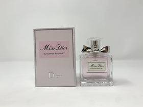 Dior Miss Blooming Bouquet Eau de Toilette Spray with floral background