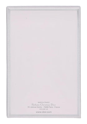 Dior Miss Dior Eau de Toilette 3.4 oz bottle with floral background