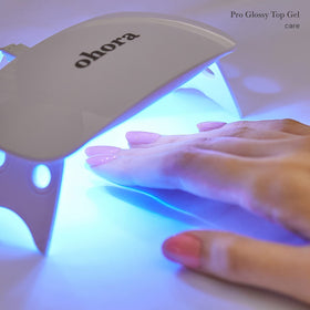 Display of different nail designs created with ohora wraps