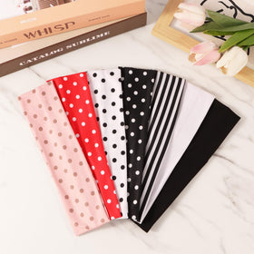 DiyJibb headbands displayed on a yoga mat