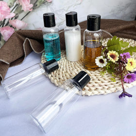 DNSEN Travel Bottles 5 Pack on a bathroom counter