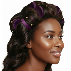 DONNA hair rollers in use on long hair