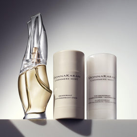 Donna Karan Cashmere Mist Deodorant Stick on a bathroom shelf