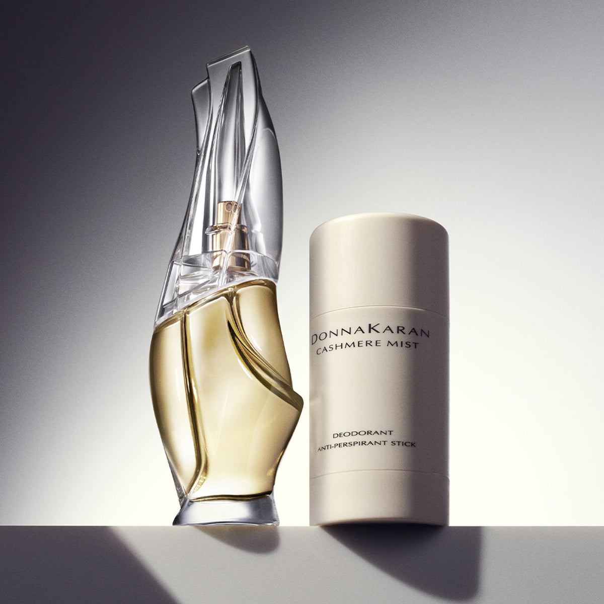 Donna Karan Cashmere Mist Discovery Duo Set with floral background