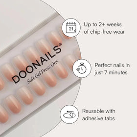 Doonails Soft Gel Press-On Nails showing adhesive tabs and rosewood stick