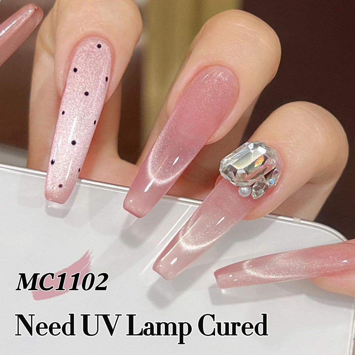 Double Rhythm Cat Eye Gel Polish on display with nail tools