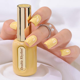 Double Rhythm Earth Yellow Gel Polish front view with round bottle