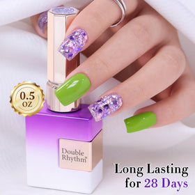 Double Rhythm Glitter Gel Polish next to nail art accessories