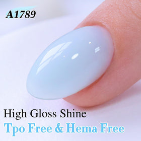 Double Rhythm Jelly Gel Polish Milky Blue applied on nails