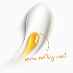 Dove body wash bottle with a soft towel