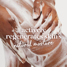 Dove Deep Moisture Body Wash lathering on skin
