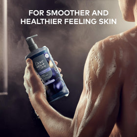 DOVE MEN + CARE Blackcurrant + Cedarwood Body Wash with lather on shower surface