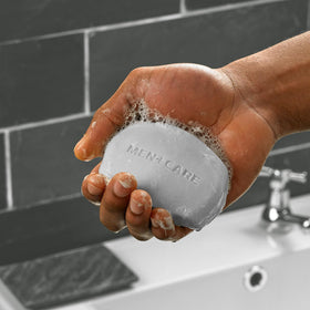Dove Men+Care soap bundle on a bathroom shelf