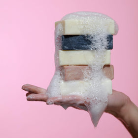 Dr. Natural Black Bar Soap in a hand wash scenario