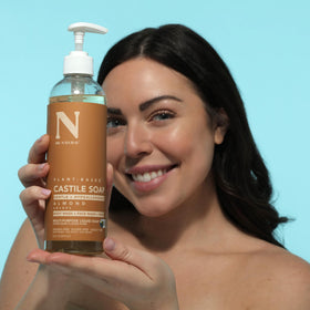 Dr. Natural Castile Liquid Soap Almond 16 oz in a bathroom setting