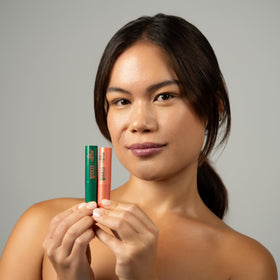 Dr. PAWPAW Enchanting Lip Balm showing colour-changing effect