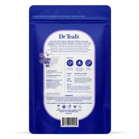Dr Teal's Epsom Salt in a bath setting with candles