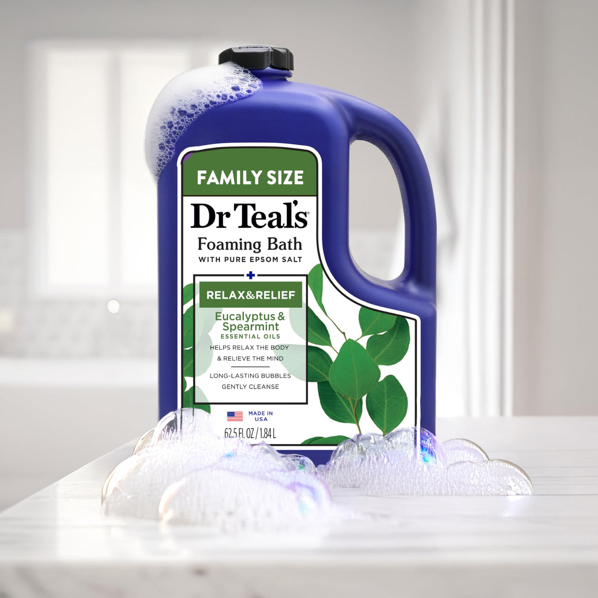 Dr Teal's Foaming Bath displayed with bath accessories