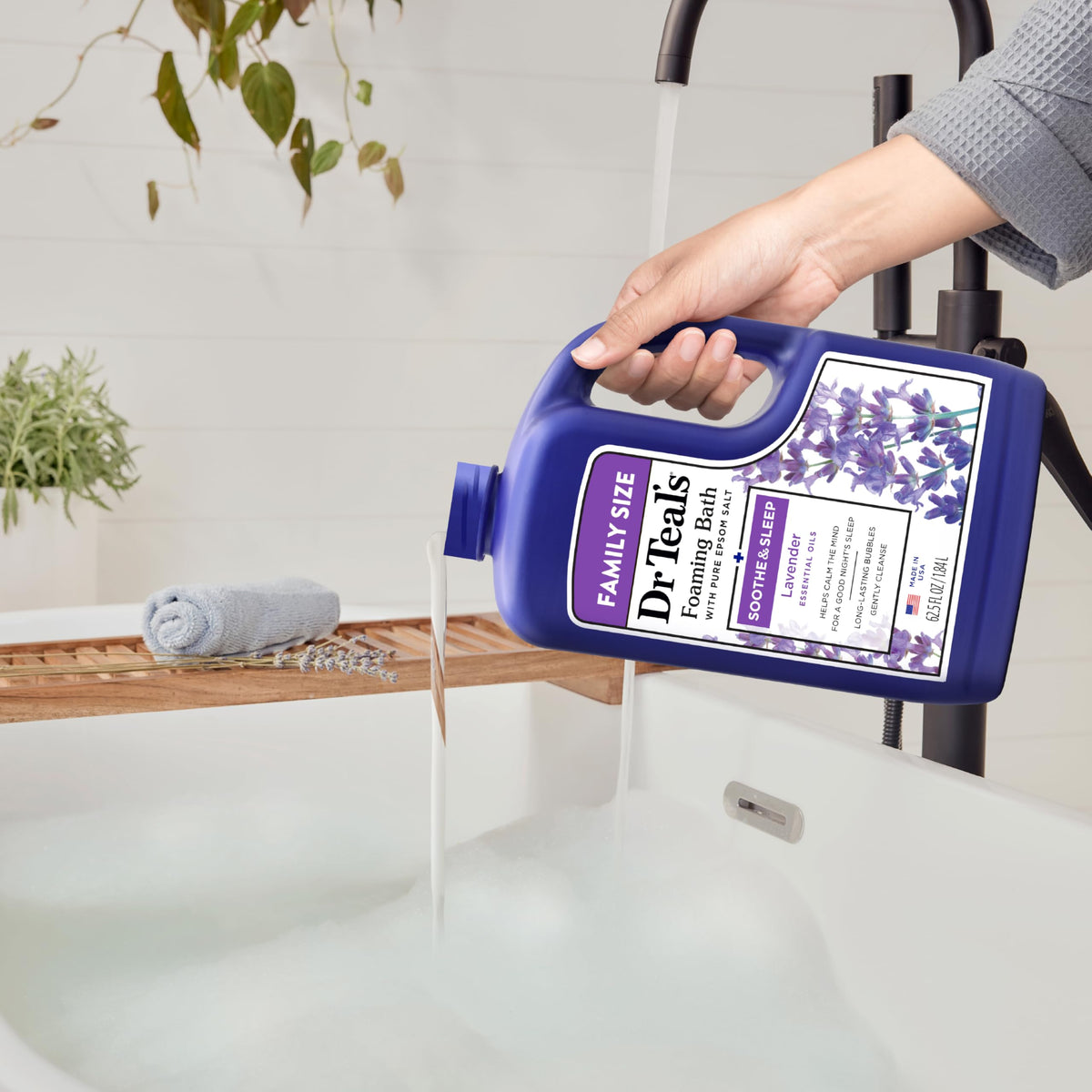 Dr Teal's Foaming Bath Lavender 62.5 fl oz with lavender flowers