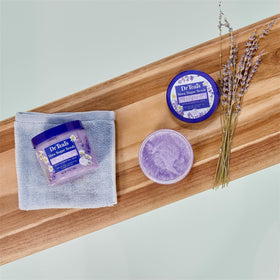 Dr Teal's Shea Sugar Sleep Scrub 19oz on a bathroom counter