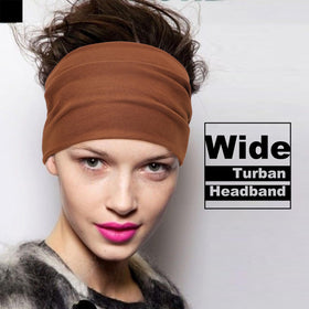 DRESHOW headband worn by a woman during yoga