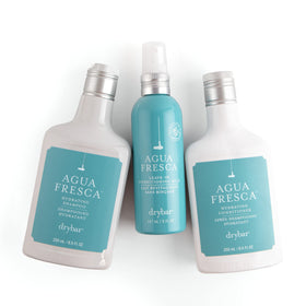 Drybar Agua Fresca Hydrating Conditioner 8.5 oz with floral background
