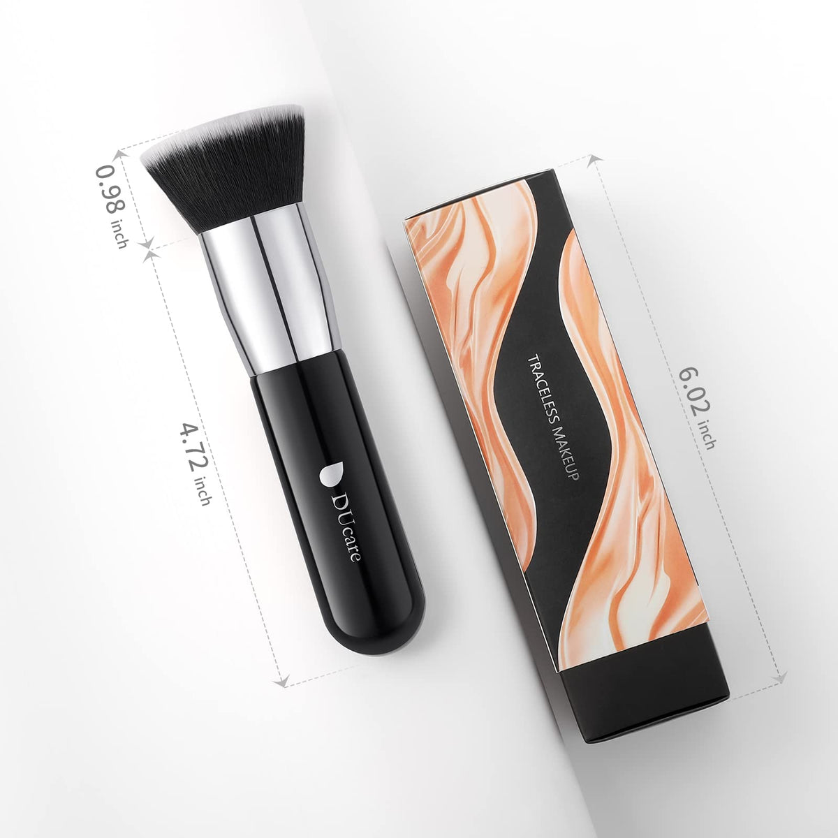 DUcare Kabuki Foundation Brush on a makeup table with products