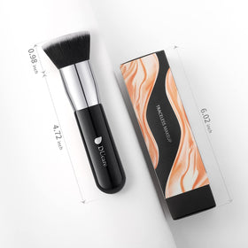 DUcare Kabuki Foundation Brush on a makeup table with products