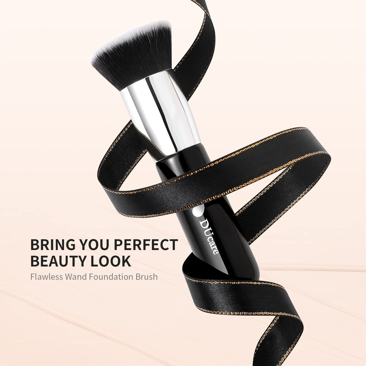 DUcare Kabuki Foundation Brush with a background of makeup tools