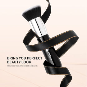 DUcare Kabuki Foundation Brush with a background of makeup tools