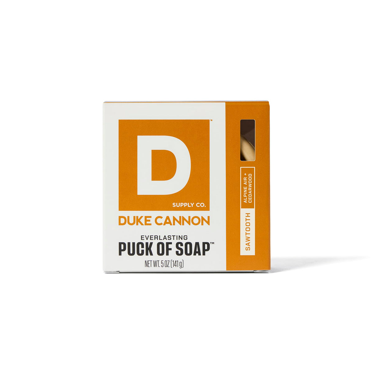 Duke Cannon Bar Soap Puck on sink with water droplets