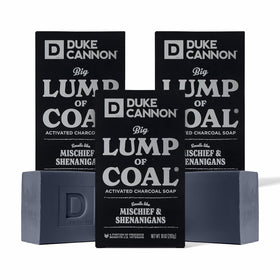 Duke Cannon Big Lump of Coal Soap Bar front view with festive packaging
