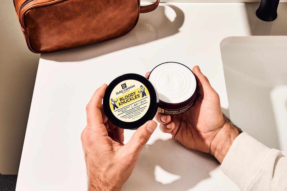 Duke Cannon Bloody Knuckles Hand Repair Balm 5 oz in a work environment