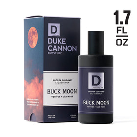 Duke Cannon Buck Moon Proper Cologne displayed with grooming products