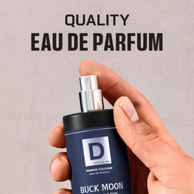 Duke Cannon Buck Moon Proper Cologne with nature background
