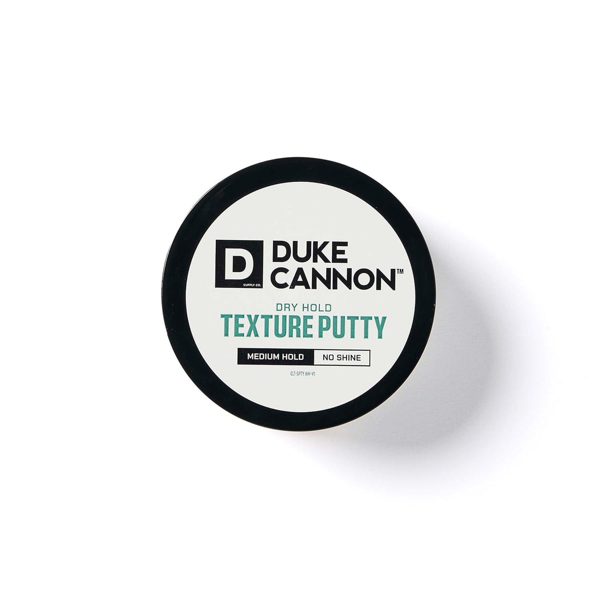 Duke Cannon Dry Hold Texture Putty on a bathroom shelf