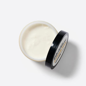 Duke Cannon Hurricane Hold Pomade 2 oz in hands with application