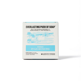 Duke Cannon Midway scent soap puck with lather