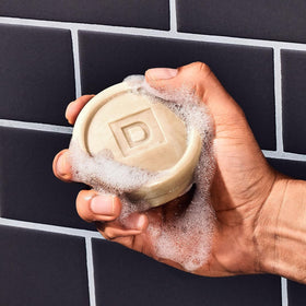 Duke Cannon Palomino Men's Soap Puck in shower setting