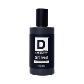 Duke Cannon Proper Cologne Deep Space bottle against a dark background