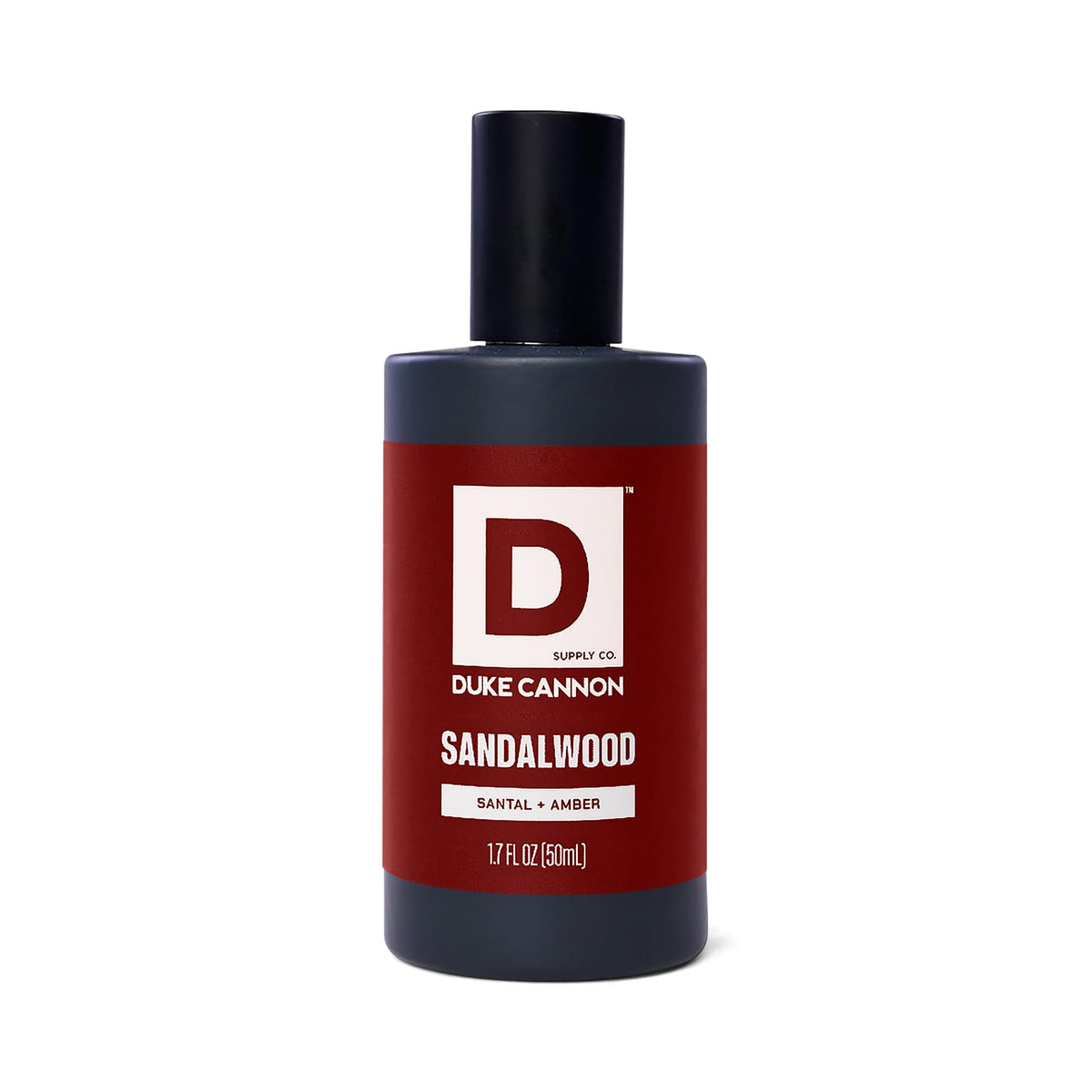 Duke Cannon Proper Cologne Sandalwood bottle on a wooden surface