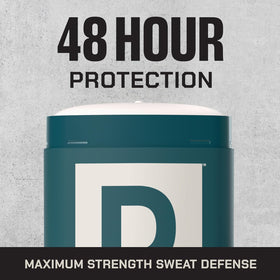 Duke Cannon Seawolf Deodorant with citrus background