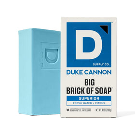 Duke Cannon soap bar on a wooden dish